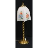 A brass barley twist table lamp, opaque glass shade decorated with flowers, 46.5cm high