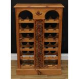 Oenophilia - a pine floor-standing wine bottle rack, moulded rectangular top above twenty-four
