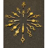 A collection of eighteen pocket watch keys