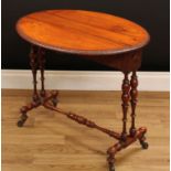 A Victorian walnut Sutherland table, oval top with fall leaves and lotus carved edge, above a pair