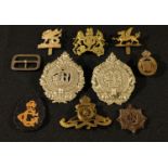 An Argyll and Sutherland cap badge; another; others, War Service 1915, etc