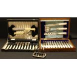 A set of twelve silver plated EPNS tea knives and forks, mother-of-pearl hafted, complete with bread