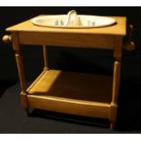 A late 19th/early 20th century child's nursery pine wash stand with ceramic bowl, the bowl blue
