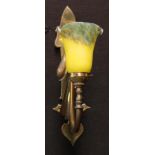 An Art Nouveau brass wall sconce with marbled glass shade
