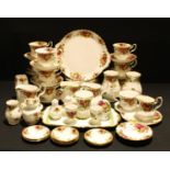 A Royal Albert Old Country Roses pattern tea set, a breakfast set with novelty egg shaped salt and