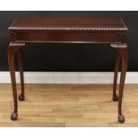 A George II design mahogany card table, rectangular top with gadrooned edge enclosing a baize