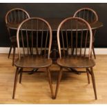An Ercol elm extending dining table, one additional leaf, baluster column, cabriole legs, 72.5cm