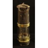 A 19th century miner's safety lamp