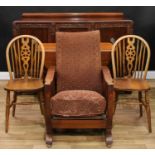 An oak gateleg dining table, 72.5cm high, 43.5cm opening to 117cm wide, 92cm deep; an oak sideboard,
