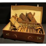 Carpentry Tools - a collection of boxwood moulding planes contained in leather suitcase
