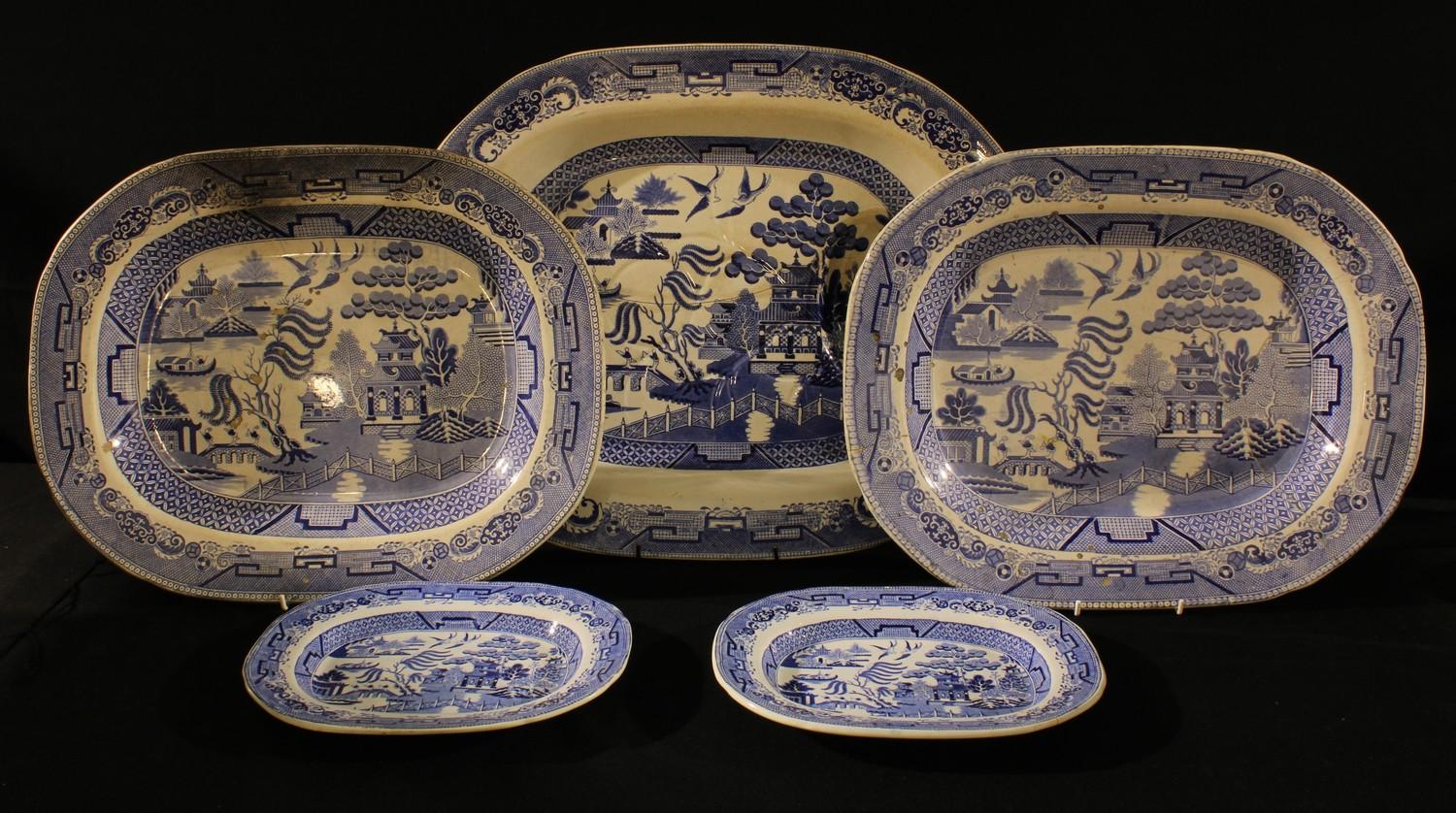 A large Willow pattern meat plate, 53cm, c.1900; others smaller (5)