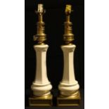 A pair of brass mounted ceramic table lamps, 65cm high overall
