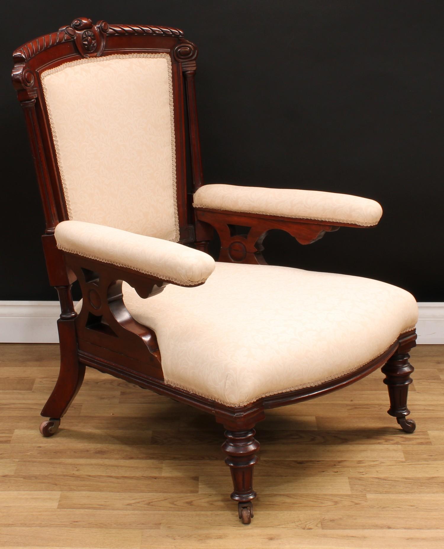 A Victorian mahogany drawing room armchair, 95.5cm high, 68cm wide, the seat 41cm wide and 63cm