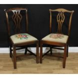 An associated pair of George III style Chippendale design dining side chairs, one stamped 4156