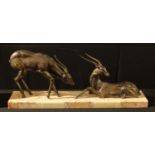 An Art Deco spelter model of a Gazelle Pair, ?A Tentative Approach?. Modelled on a marble base, c.