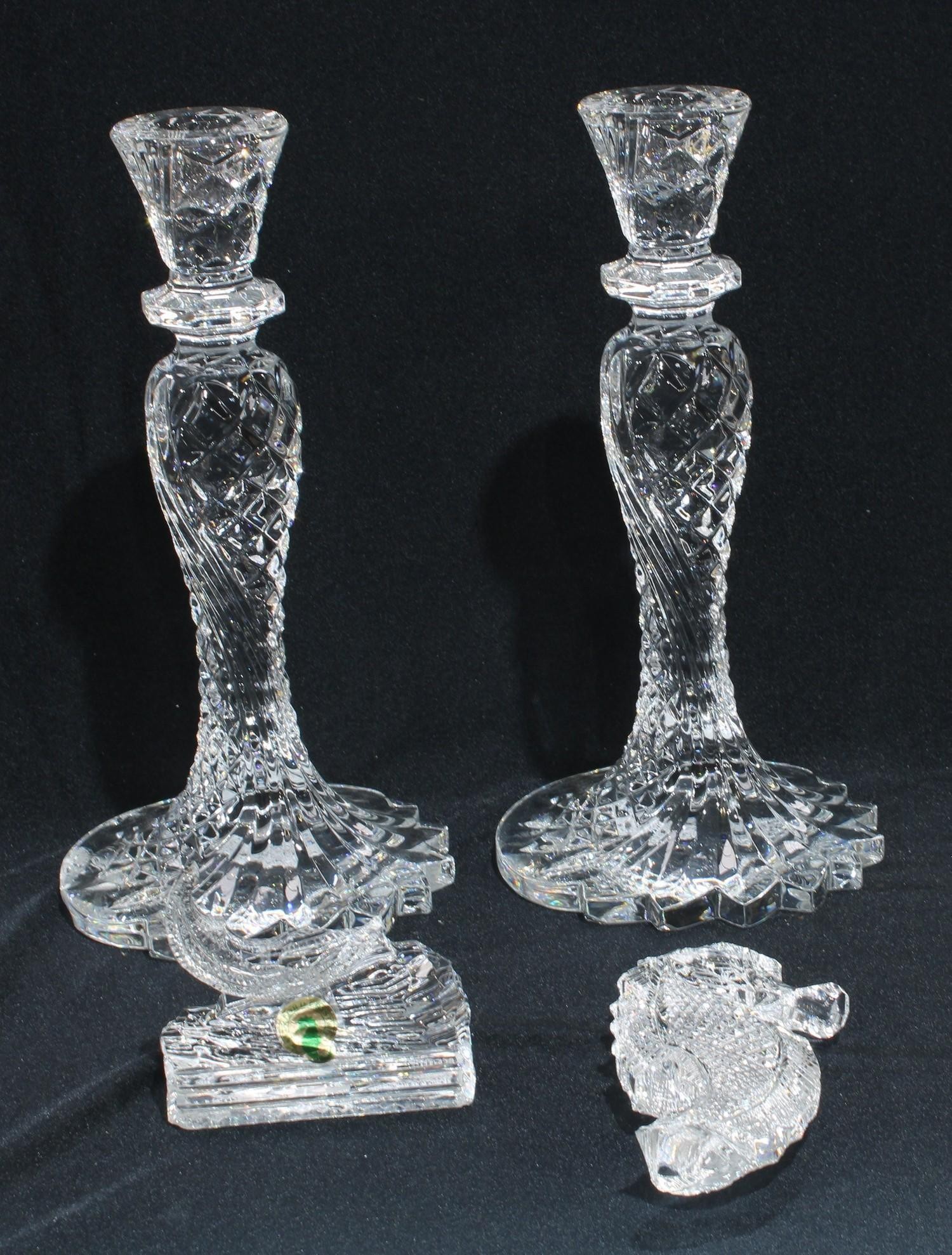 A pair of Waterford crystal candlesticks, 25cm; a Waterford model of a seahorse (3)