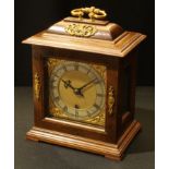 A walnut bracket clock, brass mounted, Frodsham London, 24cm high, 17cm wide
