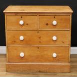A Victorian pine chest of two over three drawers, ceramic handles, 82cm high, 87.5cm wide, 44.5cm