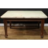 An Arts and Crafts oak dining table, 74.5cm high, 146cm long, 122cm wide, c.1910