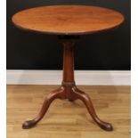 A 'George III' mahogany 'birdcage' tripod occasional table, circular one-piece tilting top,