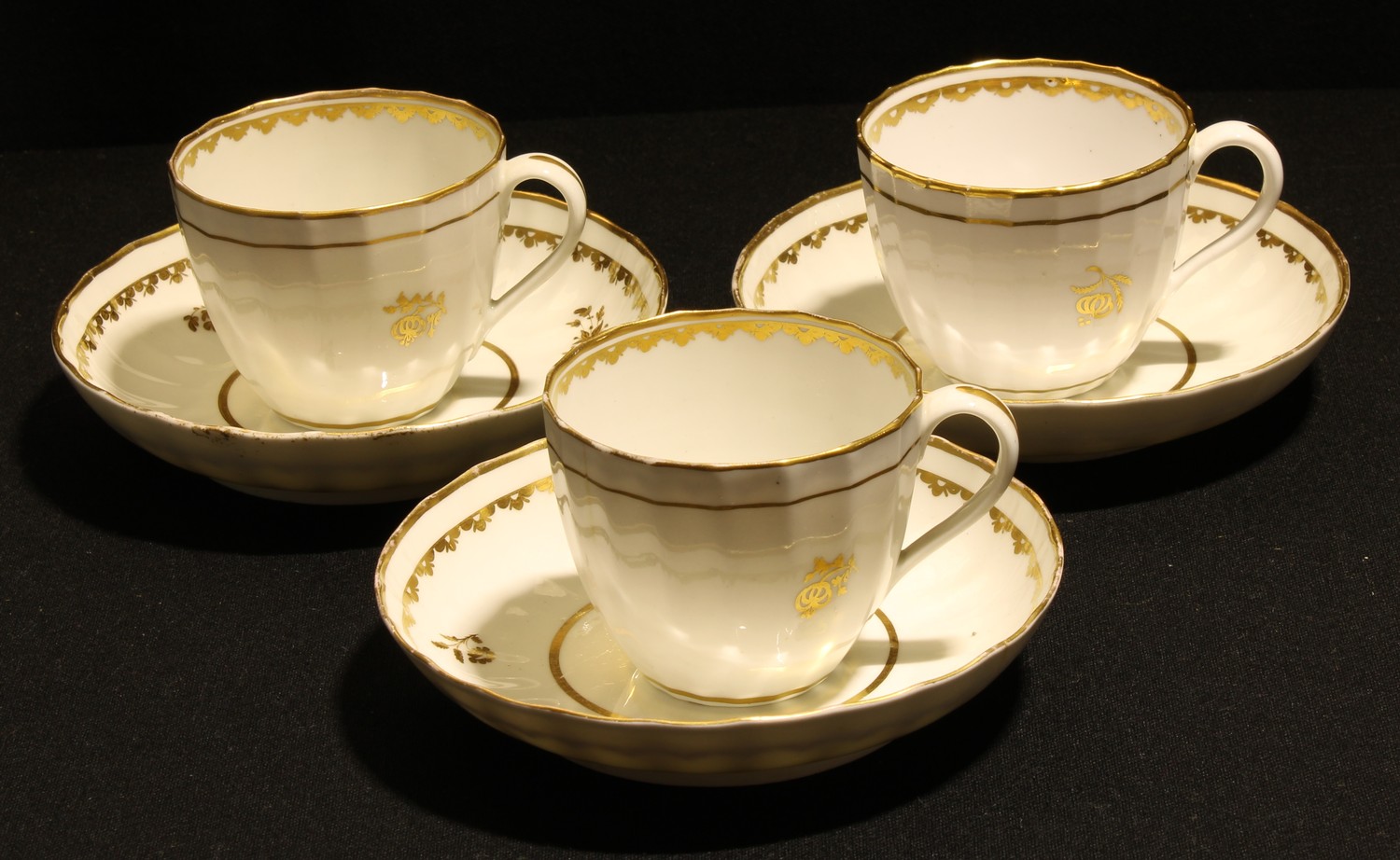 A set of three Derby Hamilton-fluted teacups and saucers, pattern 189, the saucers 14.5cm diam,