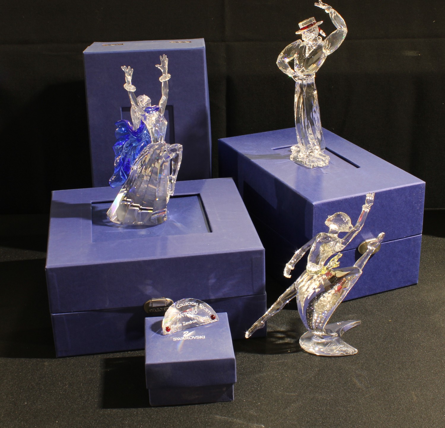 A Swarovski Crystal figure, Isadora, 2002, paperwork, boxed; two others, Antonio 2003; Anna 2004,