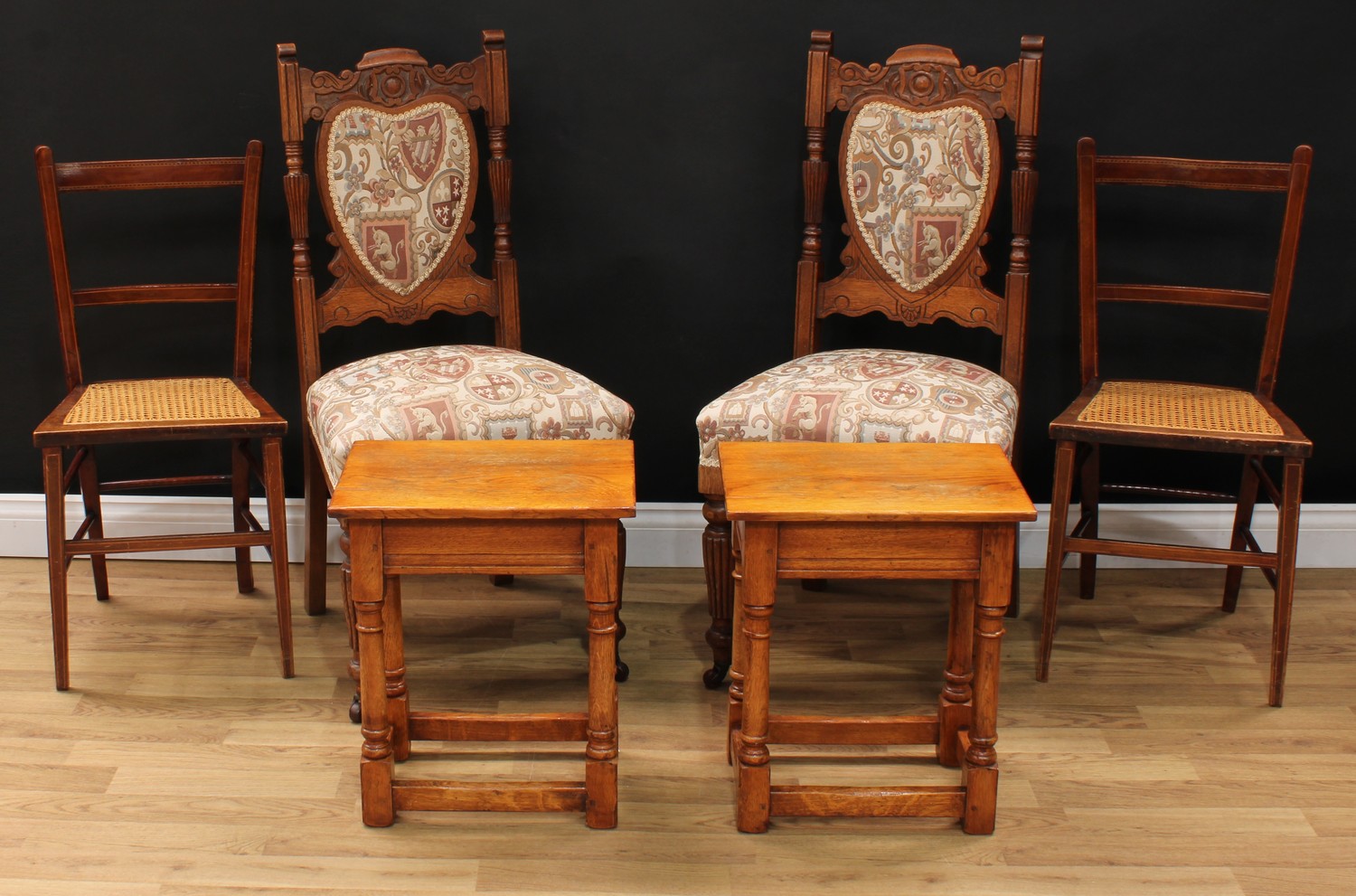 A pair of 'late Victorian' oak side chairs, 99cm high, 48cm wide, the seat 39cm deep; a pair of