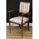 An Edwardian mahogany and marquetry elbow chair, shaped arms with baluster supports carved with