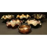 A Carnival glass amethyst Northwood type bowl, moulded with cherries and pears, 20cm diameter;