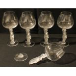 A set of four American Cambridge Glass Company wine goblets, each with frosted cherub figural stems,