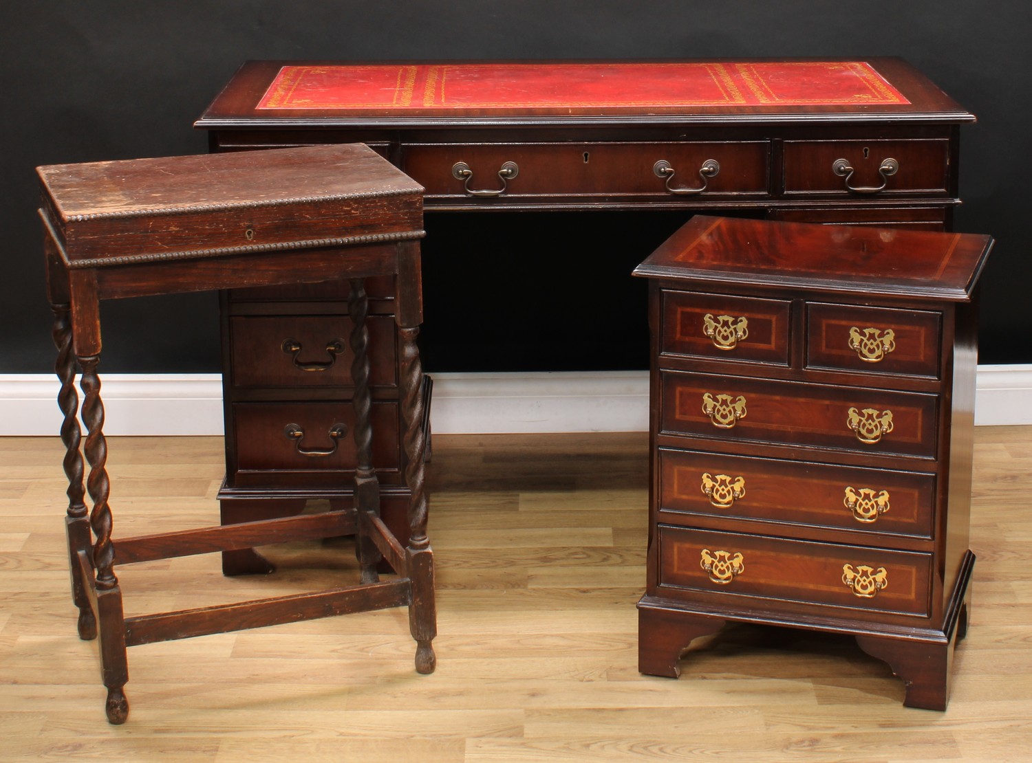 A George III style chest of two short over three long drawers, of small proportions, 61.5cm high,