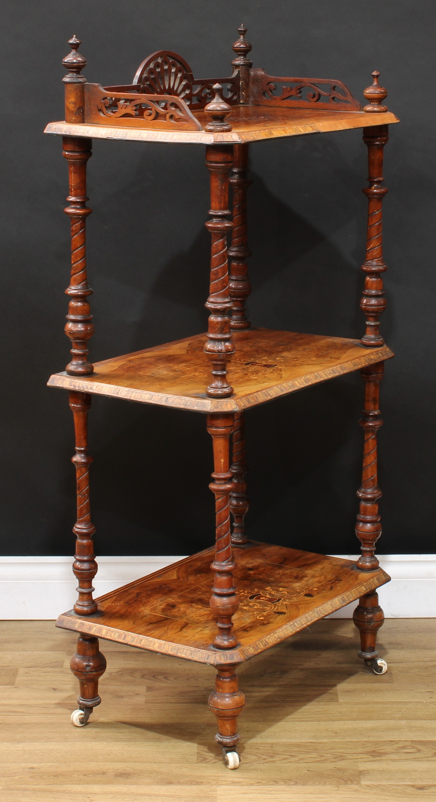 A Victorian walnut and marquetry three-tier whatnot, 114cm high, 54.5cm wide, 34.5cm deep