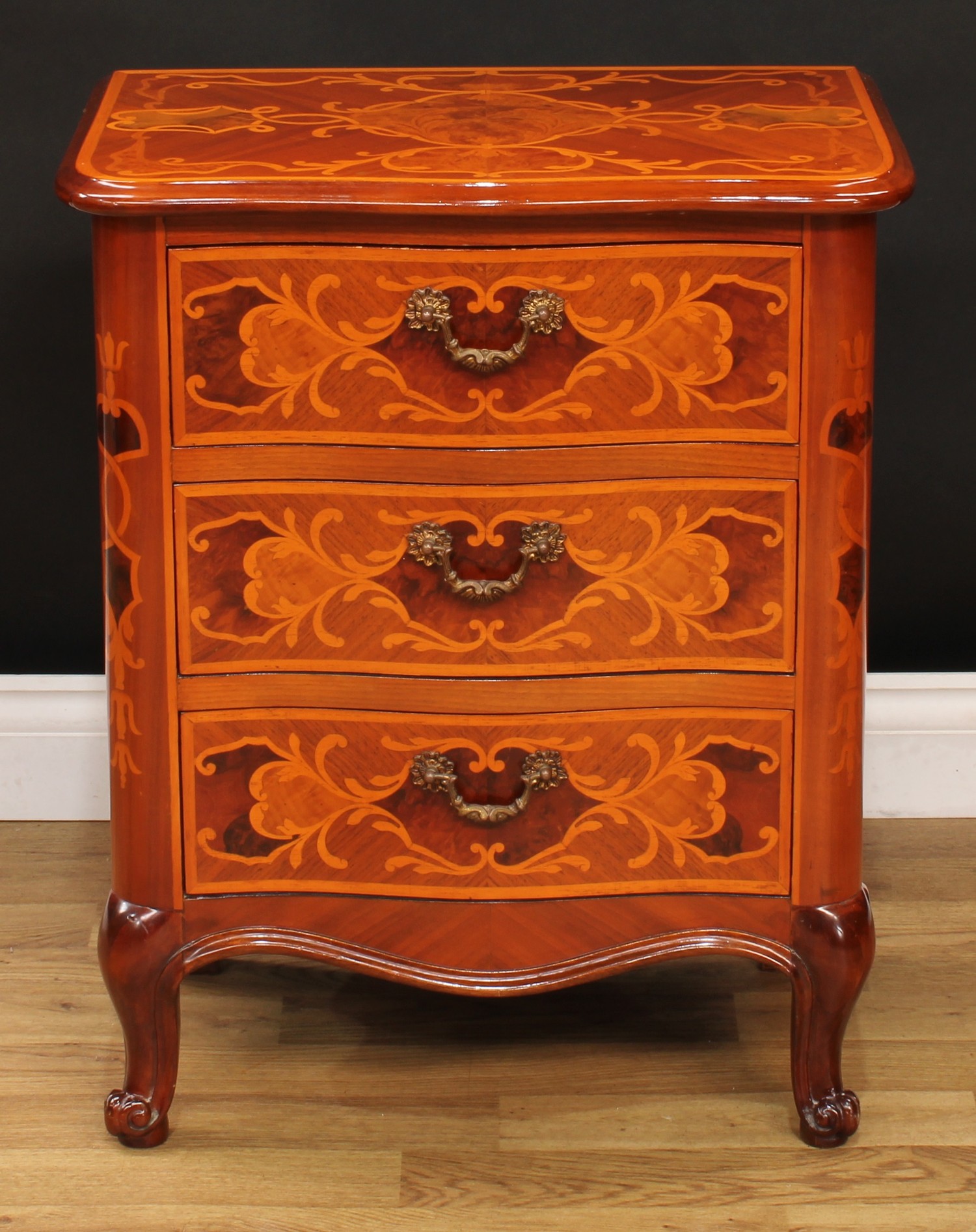 An Italian marquetry chest of three drawers, 68.5cm high, 55.5cm wide, 36cm deep
