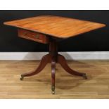 A Regency mahogany Pembroke table, rounded rectangular top with fall leaves above a frieze drawer,