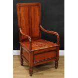 A late Victorian mahogany open arm commode chamber chair, rectangular back, downswept arms,