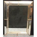 A Venetian style rectangular wall mirror, 87cm x 67cm