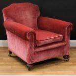 A Howard style easy armchair, shaped back, scroll arms, stuffed-over upholstery, squab cushion, 82cm