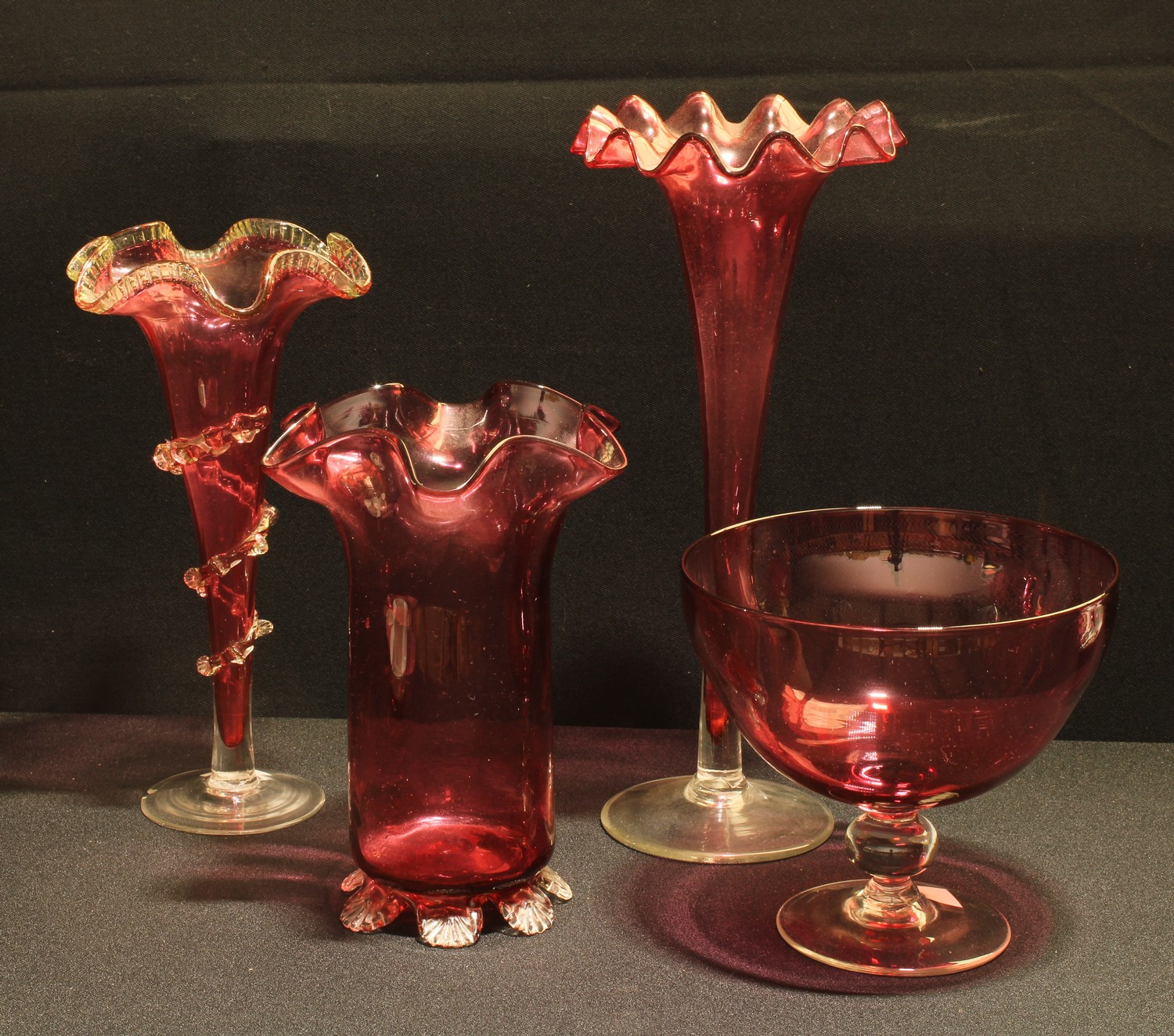 A Victorian cranberry glass frill top fluted vase, 28.5cm high; others similar (4)