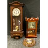 A reproduction mahogany wall clock, 15cm dial with Roman numerals, 77cm high overall; a mid/late