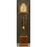 A reproduction mahogany longcase 'Tempus fugit', 195cm high.