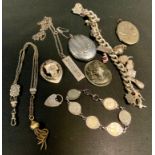 A silver charm bracelet and charms; a silver bar pendant; a silver locket; fancy Albert; etc, approx
