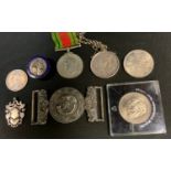 A World War II Defence medal; commemorative crowns; Sherwood Foresters belt buckle; Notts Mines