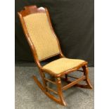 A Victorian mahogany rocking chair, serpentine seat, 90cm