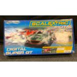 A Scalextric Digital Super GT Set, with Aston Martin DBR9, Porsche 911GT3R, and a Dodge