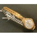 A 9ct gold lady's Waltham wristwatch, expanding strap
