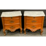 A pair of reproduction bedside chests, marble bow-front top above three short graduated cockbeaded