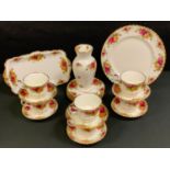 A Royal Albert Old County Roses tea service, for six, printed marks; a similar vase