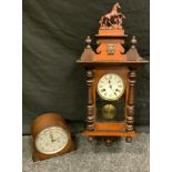 A Junghans oak and mahogany wall clock; a Smiths oak mantel clock (2)