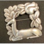 Arno Malinowski for Georg Jensen a sterling silver square squirrel and deer brooch, signed, sterling