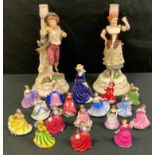 Six Royal Doulton miniature figures; a pair of German figural candlesticks, c.1900; etc